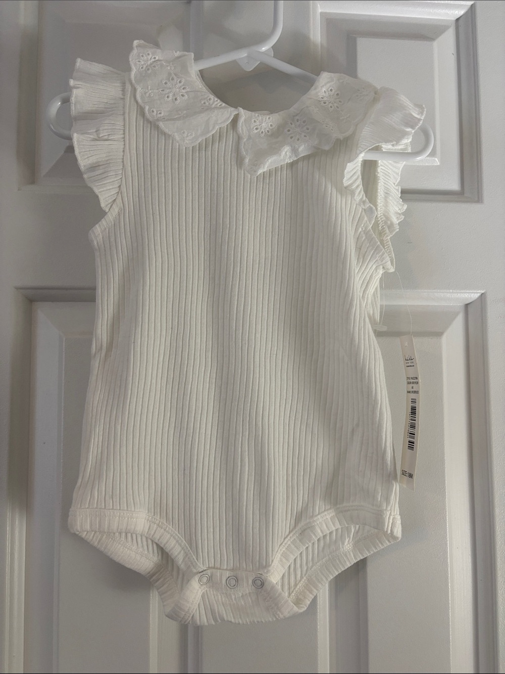 Nicole Miller White Ribbed One-Piece with Eyelet Collar and Flutter Sleeves
